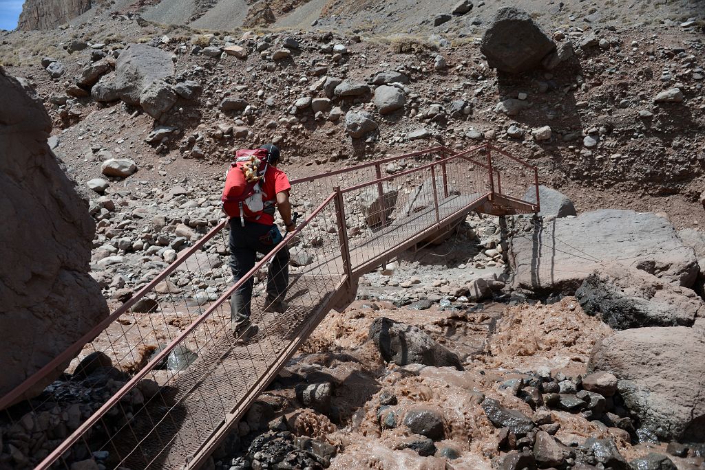 19 Agustin Crossing A Metal Bridge Over The Horcones River Before The Final Ascent To Confluencia On The Descent From Plaza de Mulas